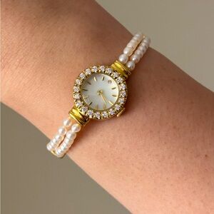 Elegant Gold and Pearl Women's Watch